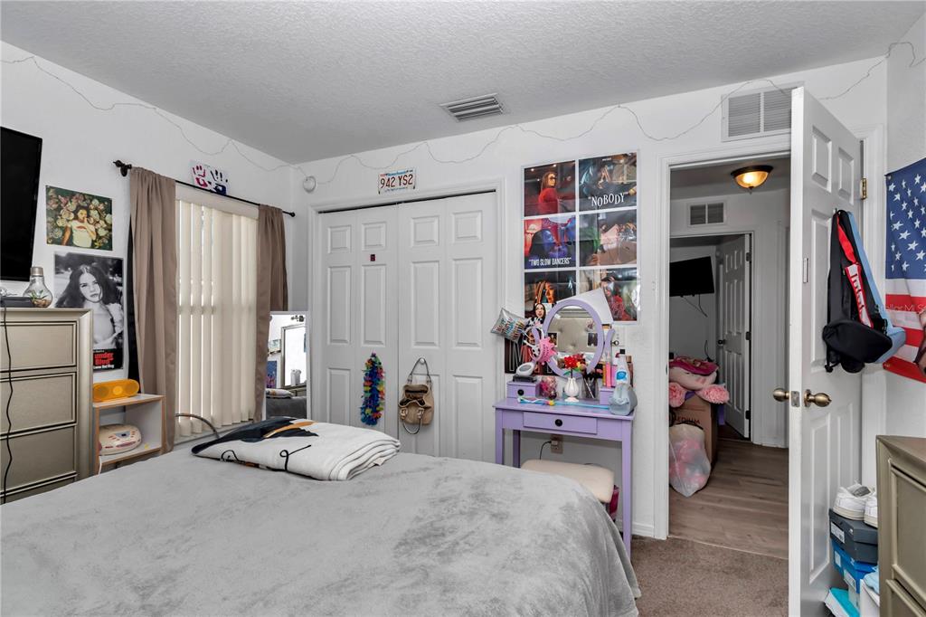 13800 Southwest 33rd Court Road Ocala, FL 34473 - Photo 31 of 42 a bedroom with a bed and a window