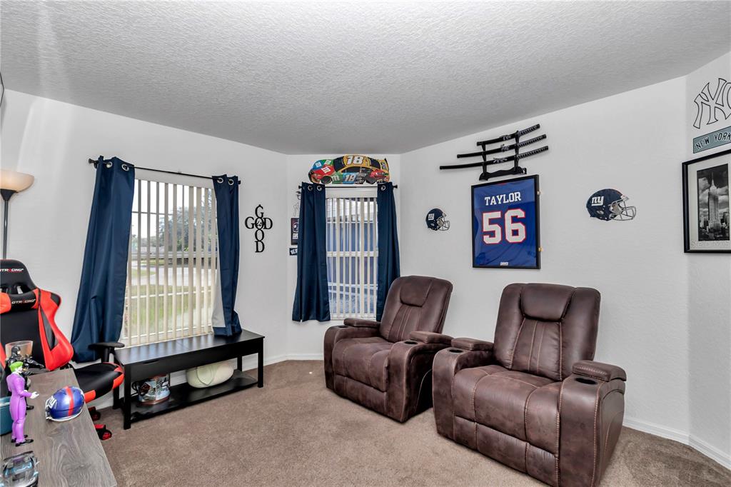 13800 Southwest 33rd Court Road Ocala, FL 34473 - Photo 36 of 42 a living room with furniture and a window