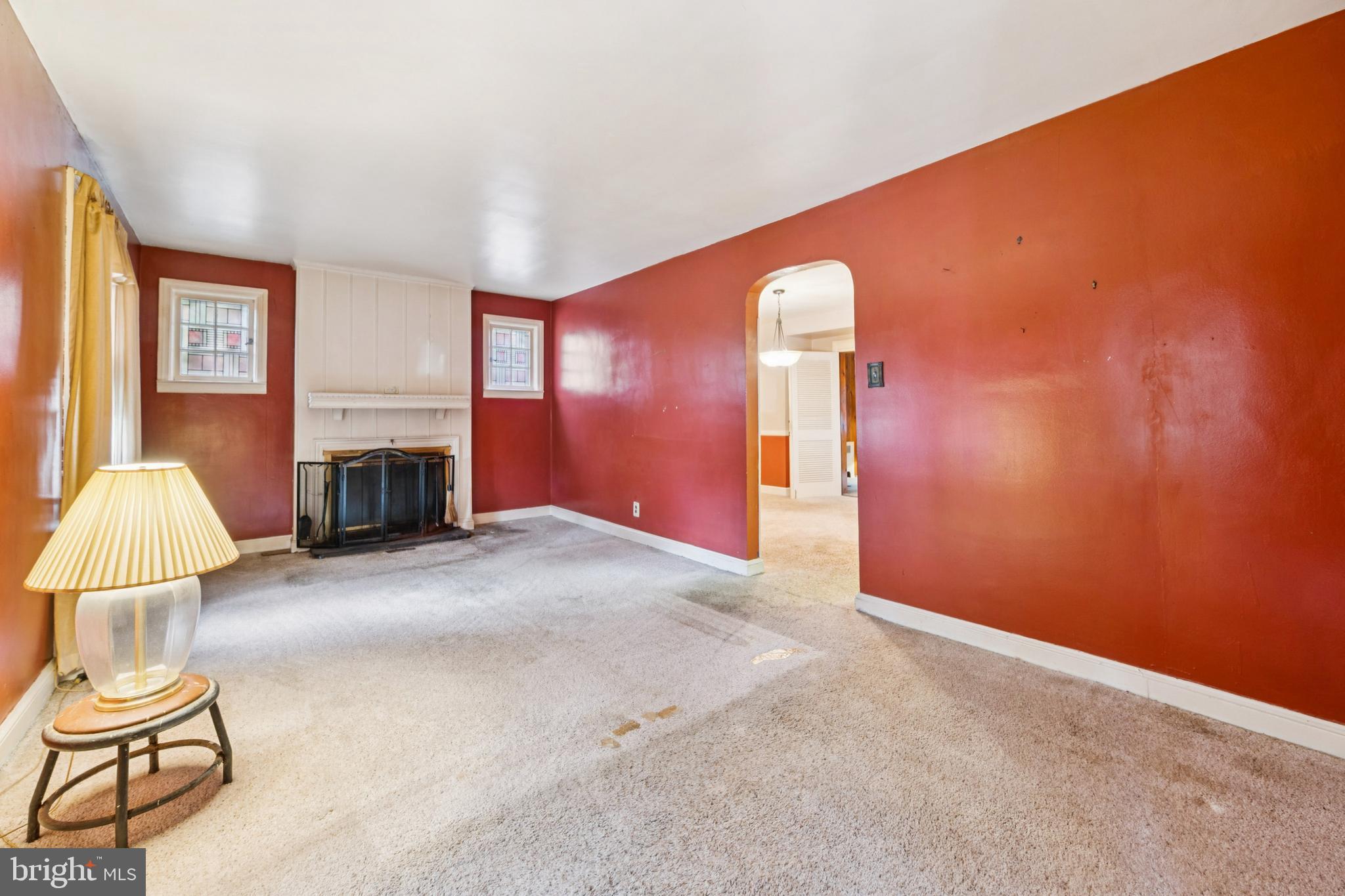 4817 Browning Road Pennsauken, NJ 08109 - Photo 5 of 25 a view of livingroom with fireplace and window