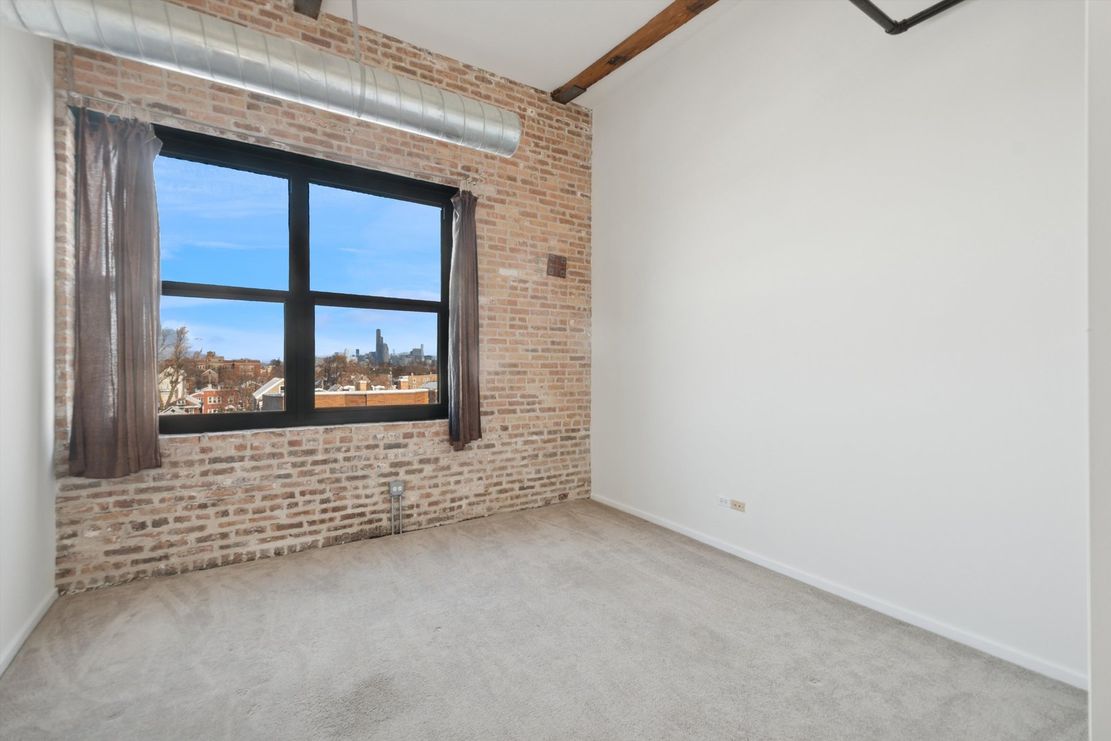 3500 South Sangamon Street, Unit 401 Chicago, IL 60609 - Photo 11 of 18 a view of a brick house with a large window