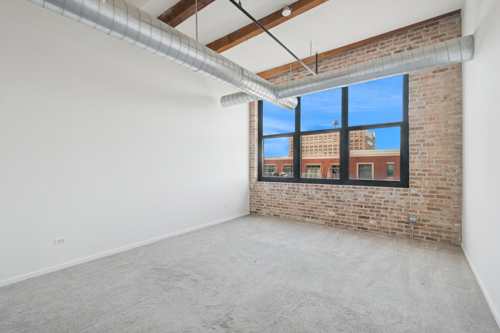 3500 South Sangamon Street, Unit 401 Chicago, IL 60609 - Photo 13 of 18 a view of an empty room with a window