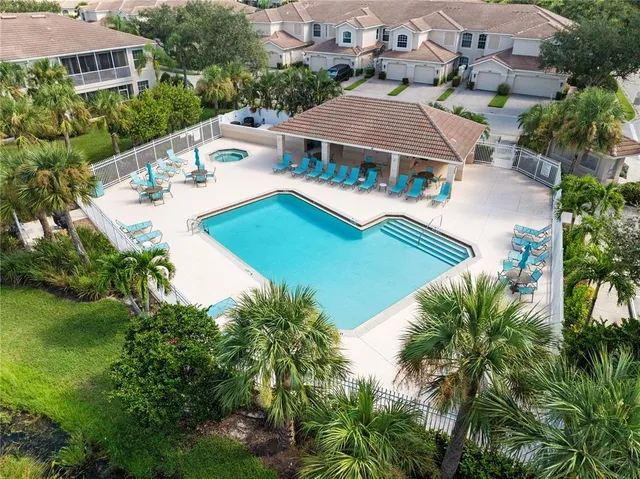 an aerial view of a house with outdoor space