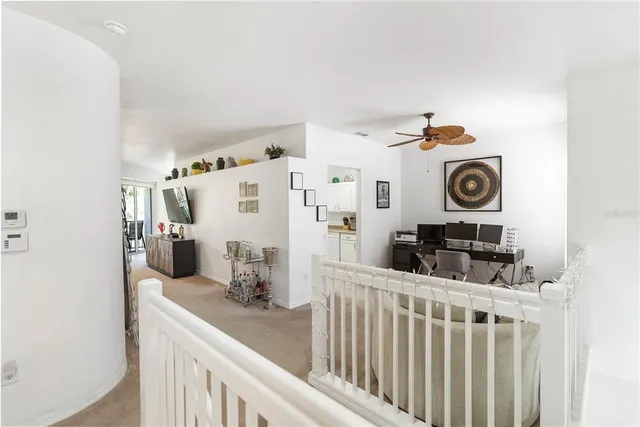 a work room with furniture and a window