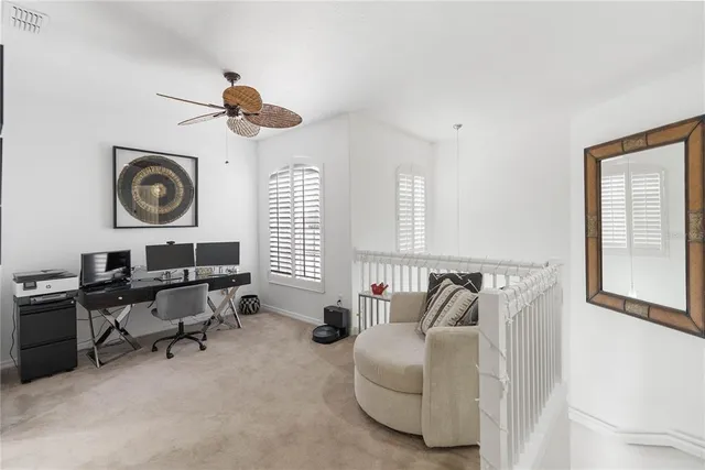 a room with stainless steel appliances kitchen island granite countertop a sink and cabinets