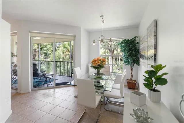 a view of kitchen with sink and living room