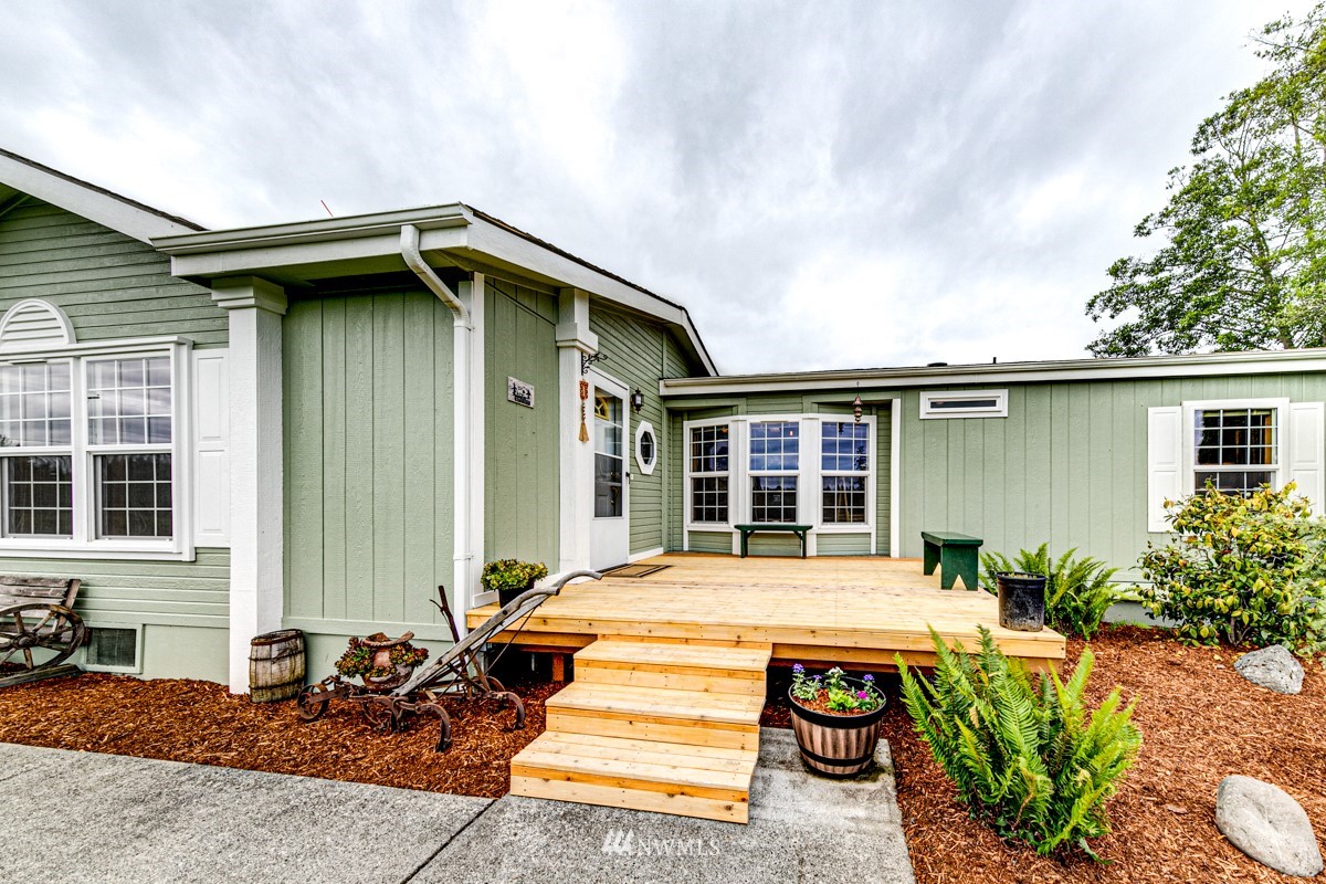 80 Cassidy Road Sequim, WA 98382 - Photo 7 of 40 a backyard of a house with seating space