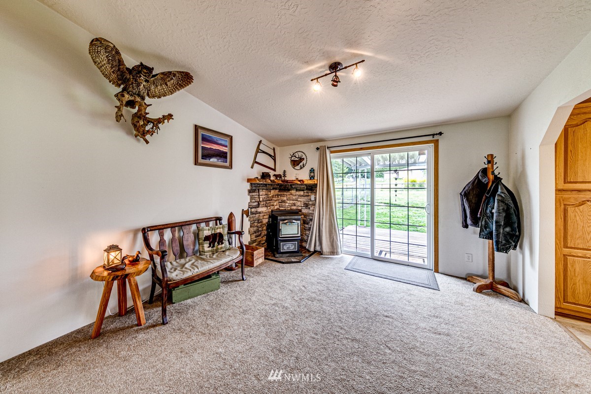 80 Cassidy Road Sequim, WA 98382 - Photo 9 of 40 a view of a livingroom with furniture and a ceiling fan