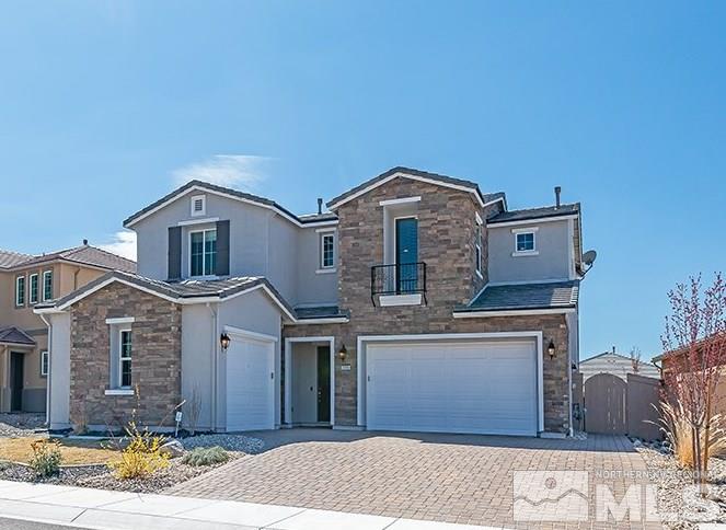 3190 Show Jumper Lane Reno, NV 89521 - Photo 1 of 32 a front view of a house with a yard