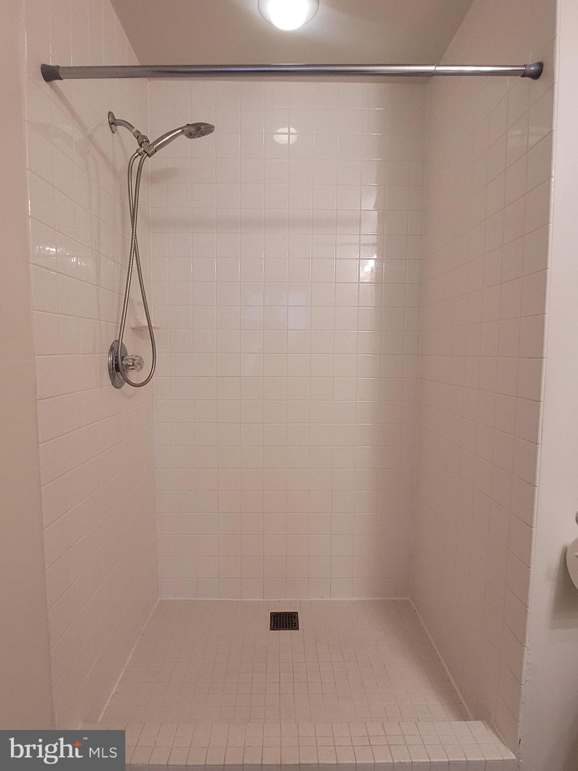 1427 Walnut Street, Unit 3F Philadelphia, PA 19102 - Photo 10 of 14 a bathroom with a shower