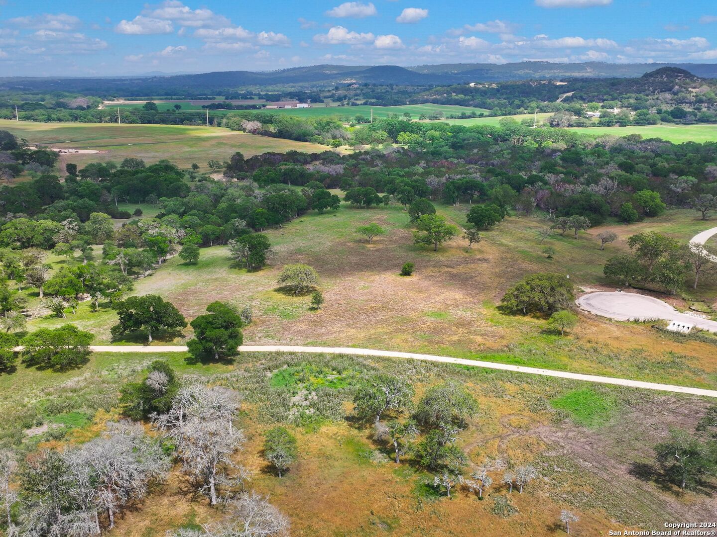 Lot 169 Coldwater Drive Center Point, TX 78010 - Photo 12 of 25 a view of a lake with a city
