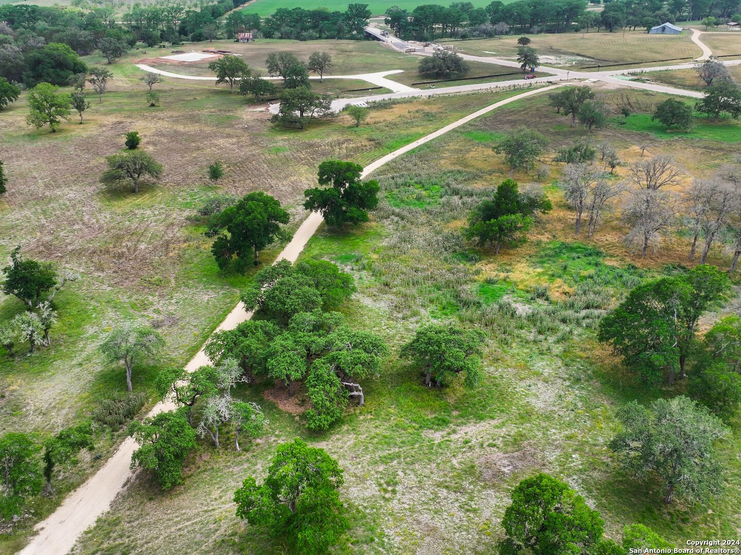 Lot 169 Coldwater Drive Center Point, TX 78010 - Photo 16 of 25 an aerial view of residential houses with outdoor space and trees