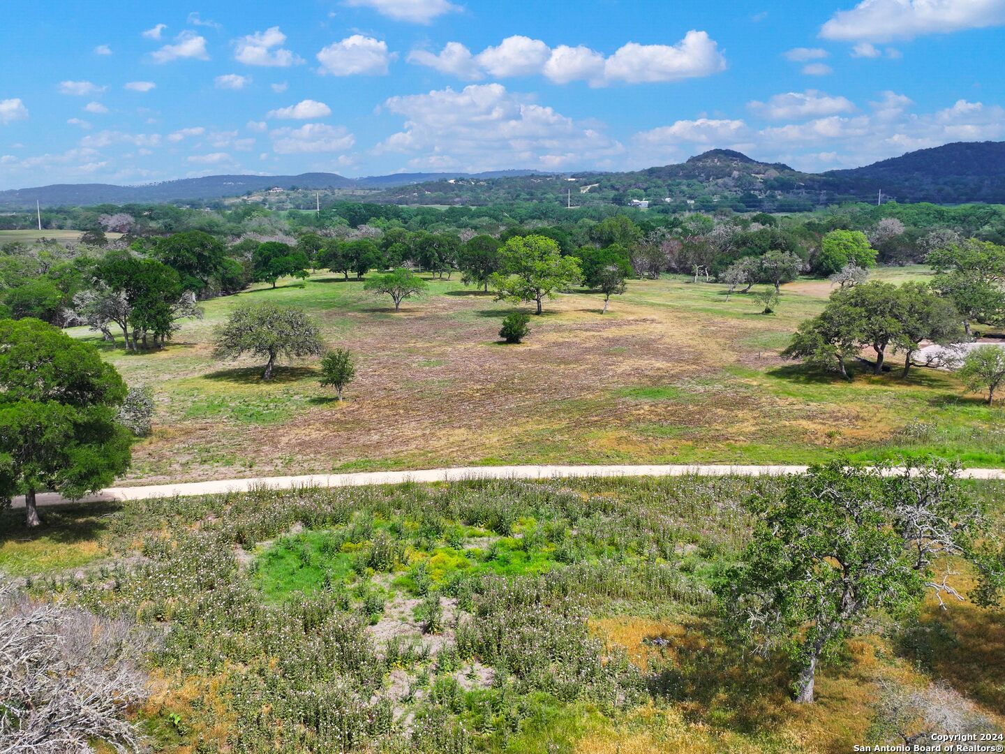 Lot 169 Coldwater Drive Center Point, TX 78010 - Photo 18 of 25 a view of a town with mountains in the background