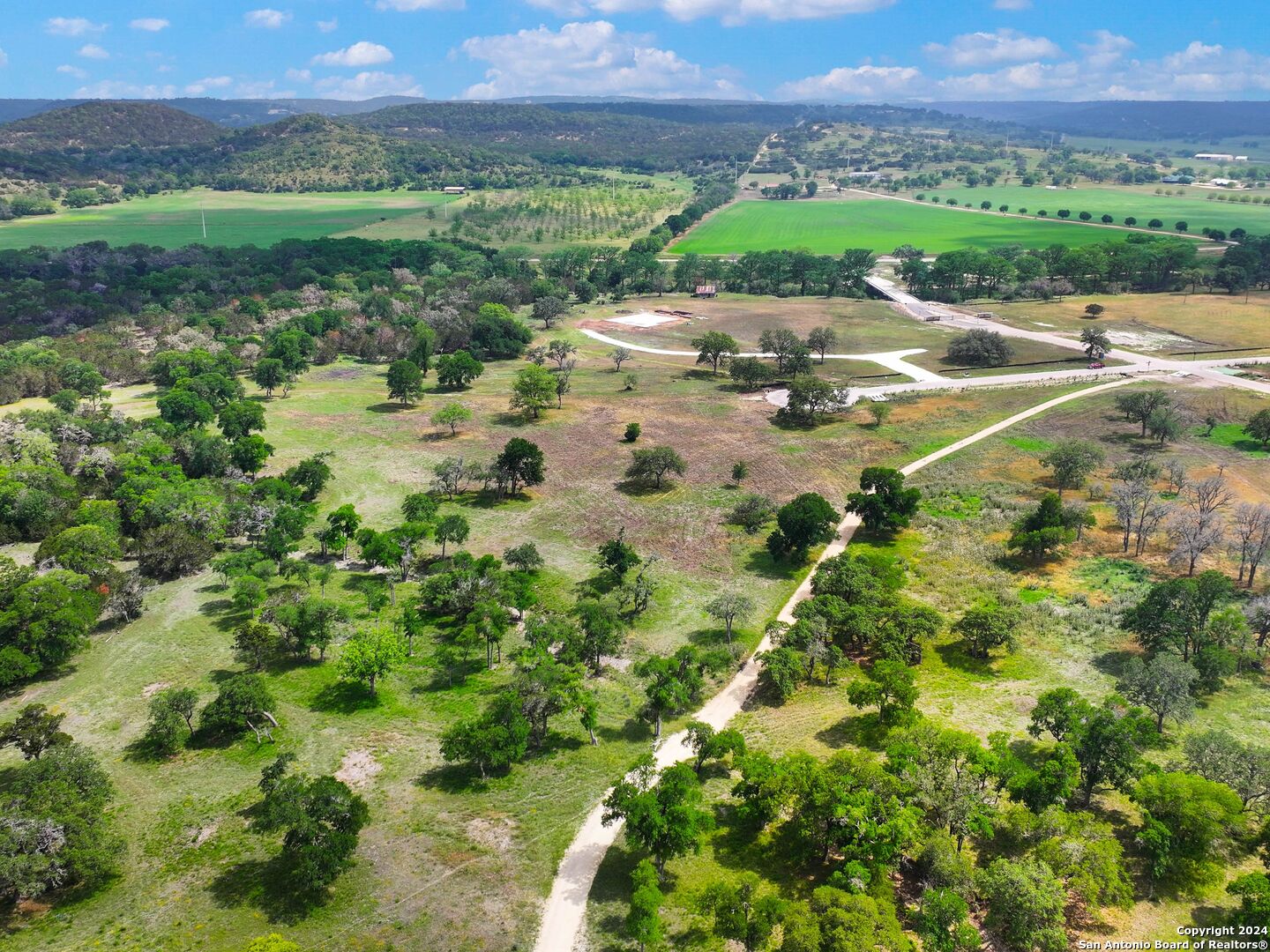Lot 169 Coldwater Drive Center Point, TX 78010 - Photo 10 of 25 a view of a lush green field
