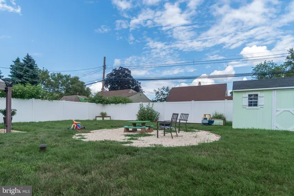 a garden view with a seating space