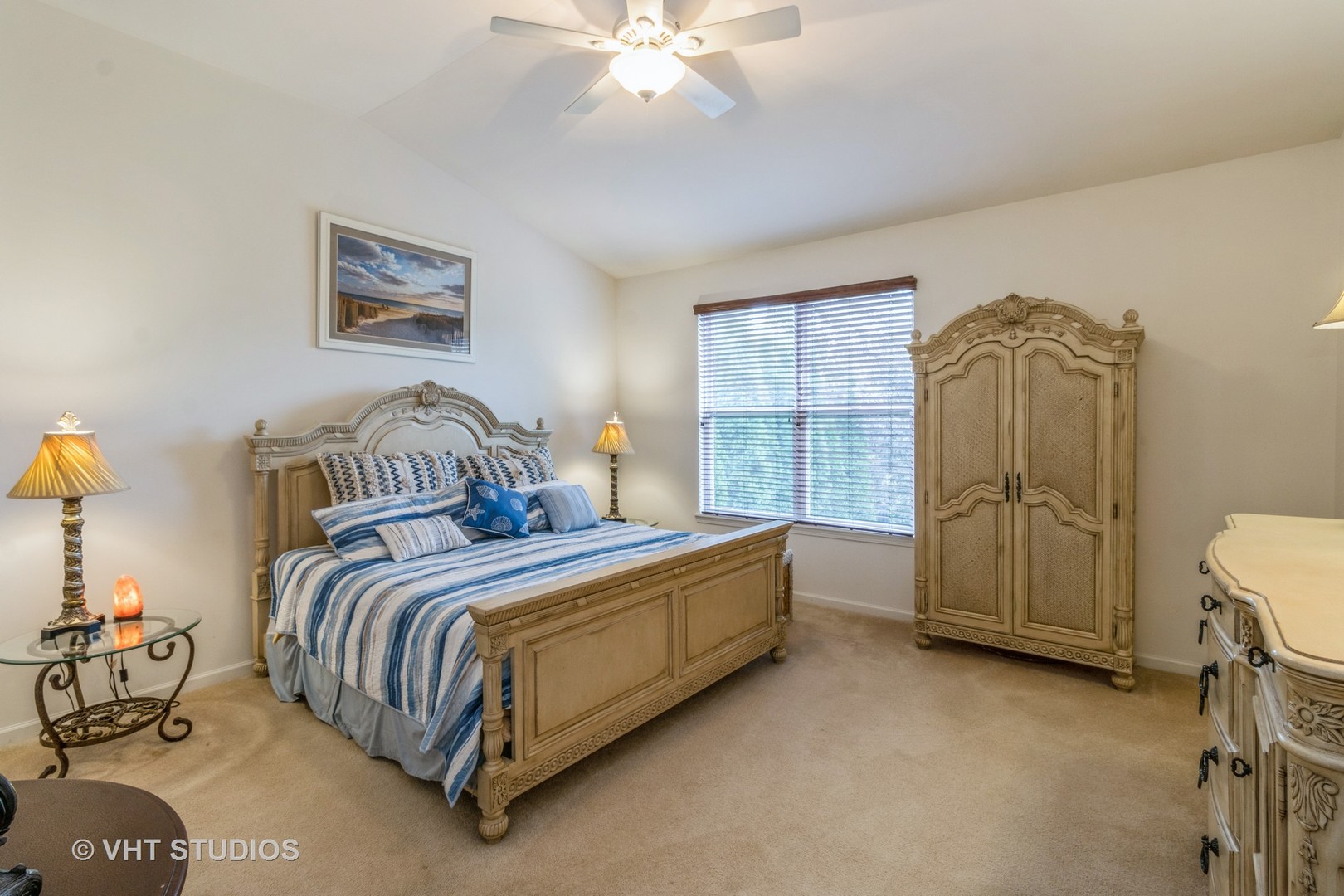 607 Waterford Road Elgin, IL 60124 - Photo 16 of 34 a bedroom with a bed and a chandelier