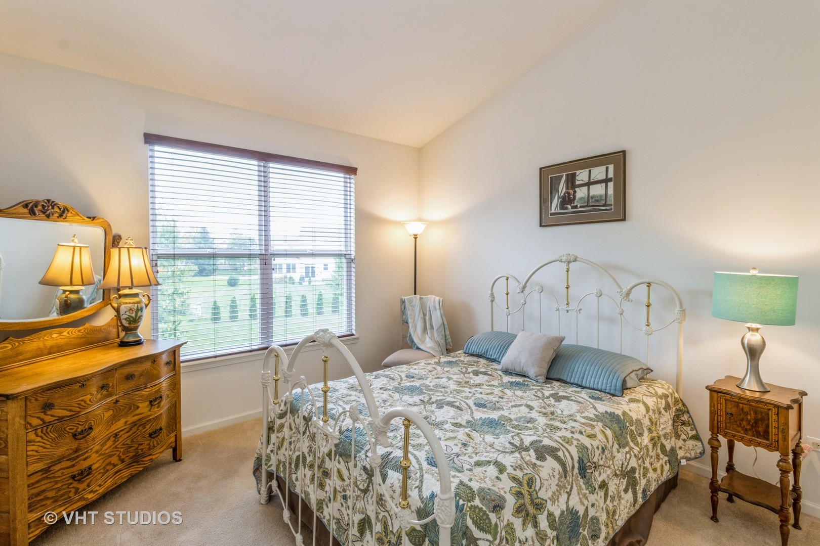 607 Waterford Road Elgin, IL 60124 - Photo 20 of 34 a bedroom with a bed and wooden floor