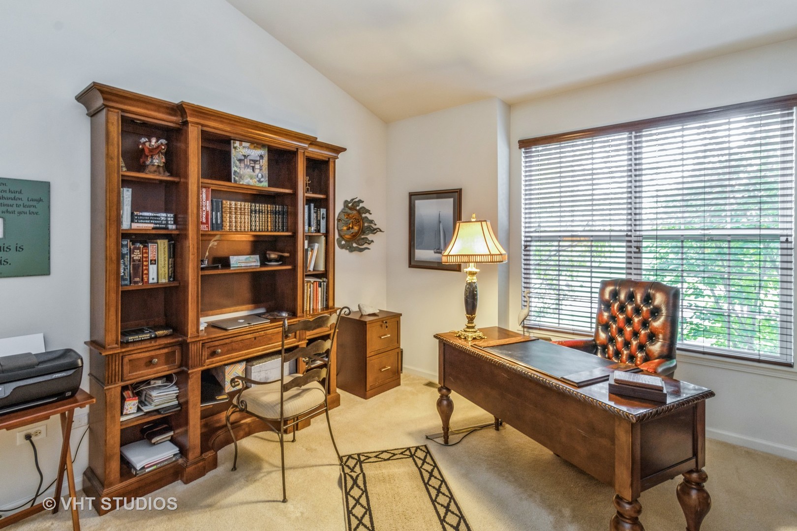 607 Waterford Road Elgin, IL 60124 - Photo 22 of 34 a living room with furniture a rug and a large window