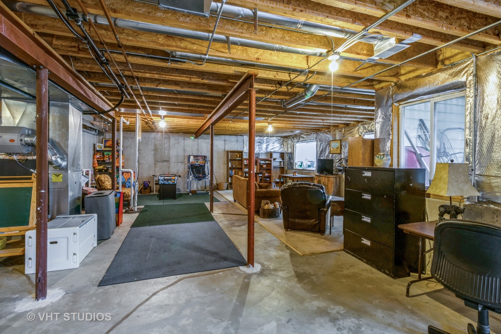 607 Waterford Road Elgin, IL 60124 - Photo 24 of 34 a view of a storage room with lots of stuff