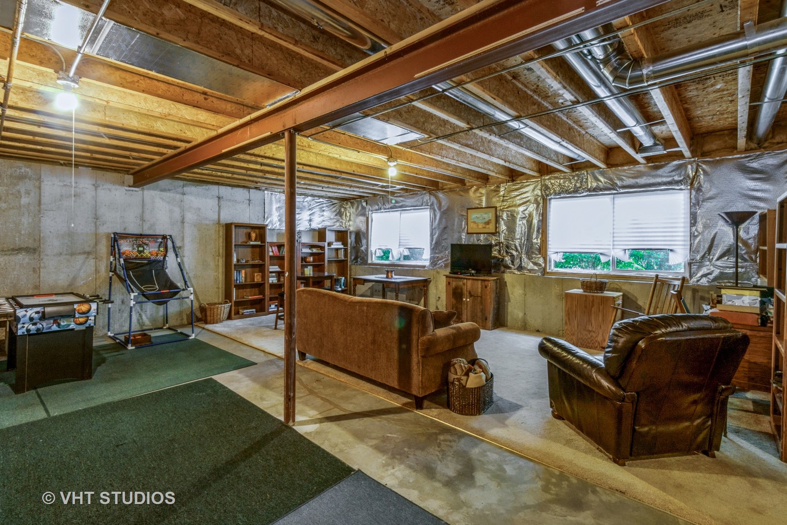 607 Waterford Road Elgin, IL 60124 - Photo 25 of 34 a view of a patio with couches chairs and kitchen view