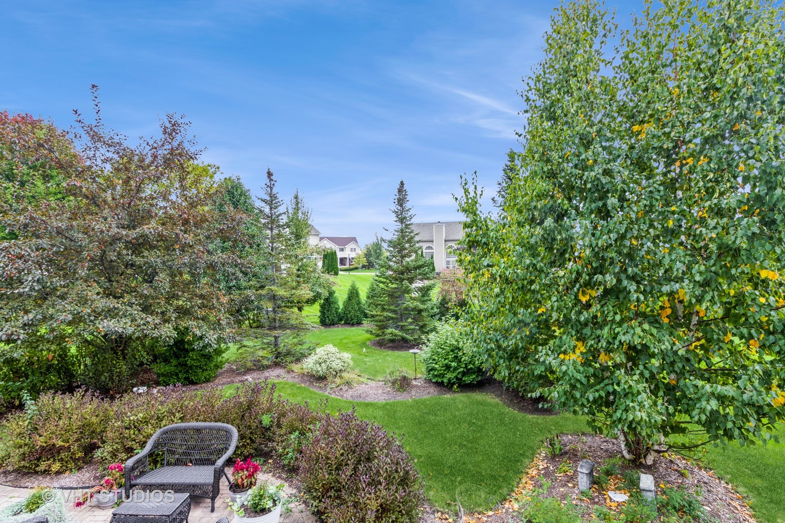 607 Waterford Road Elgin, IL 60124 - Photo 28 of 34 a view of a bunch of trees and bushes