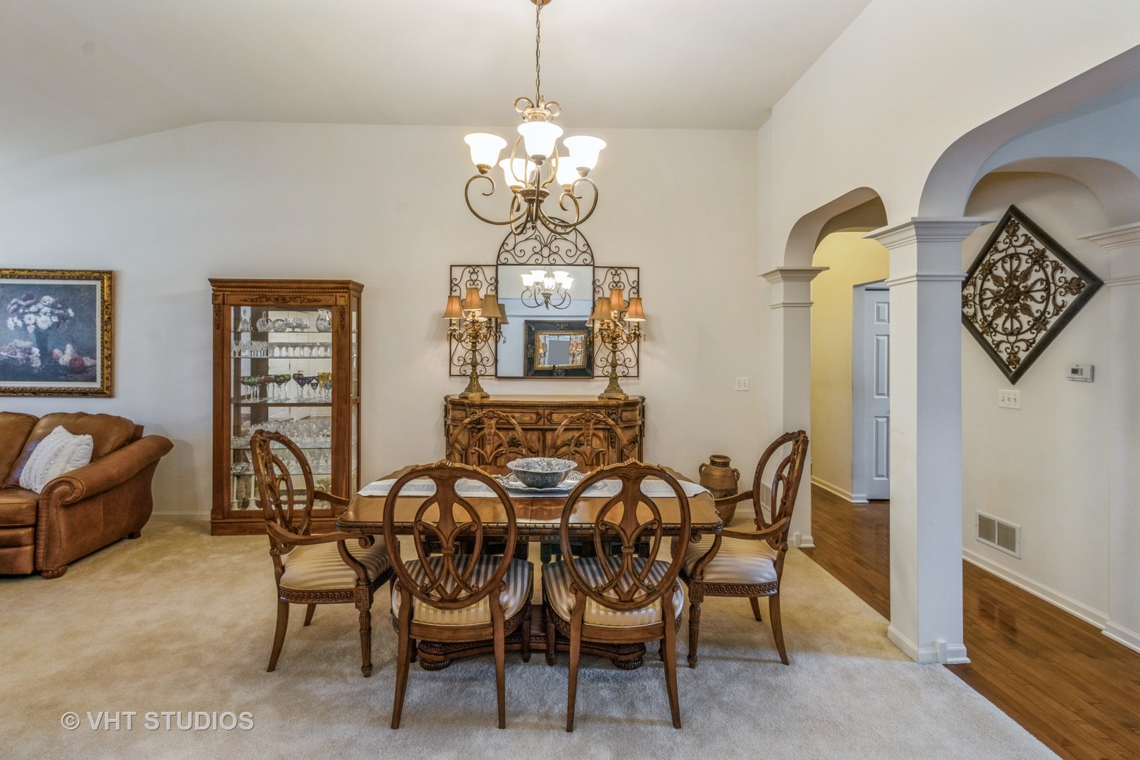607 Waterford Road Elgin, IL 60124 - Photo 9 of 34 a view of a dining room with furniture and chandelier