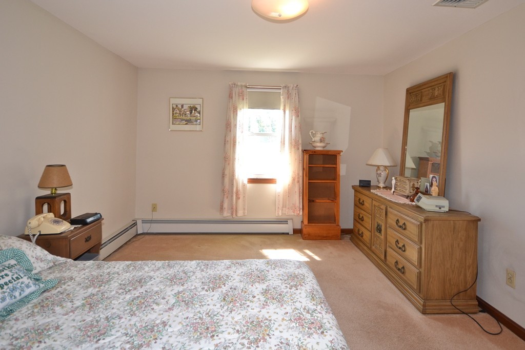722 Snipatuit Road Rochester, MA 02770 - Photo 7 of 15 a view of an empty room and window