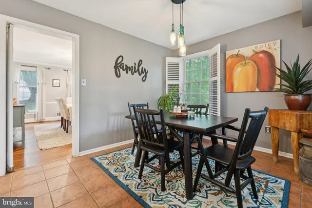 a utility room with sink dryer and washer