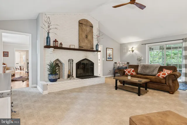 a bedroom with a bed and a night stand