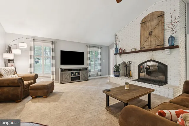 a spacious bathroom with a double vanity sink and a mirror