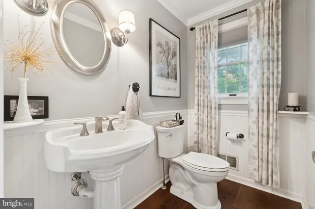 a bed room with a bed and a window