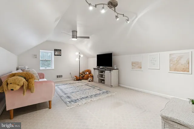 a outdoor living with furniture and garden view