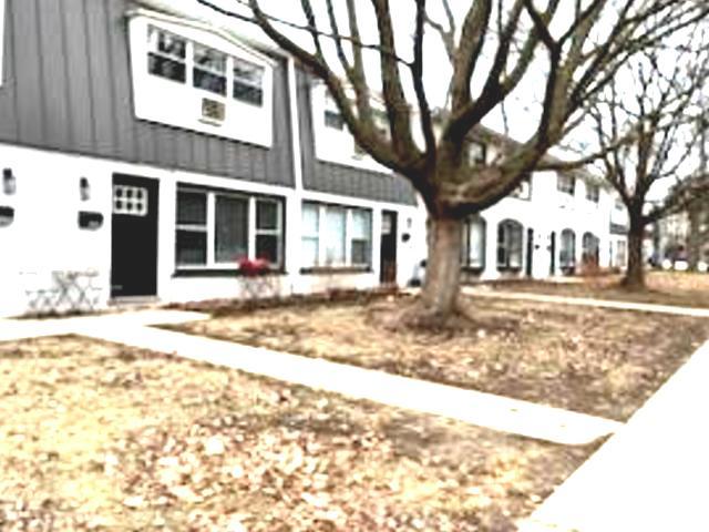 1900 Green Bay Road, Unit J Highland Park, IL 60035 - Photo 2 of 24 a front view of a building with street view