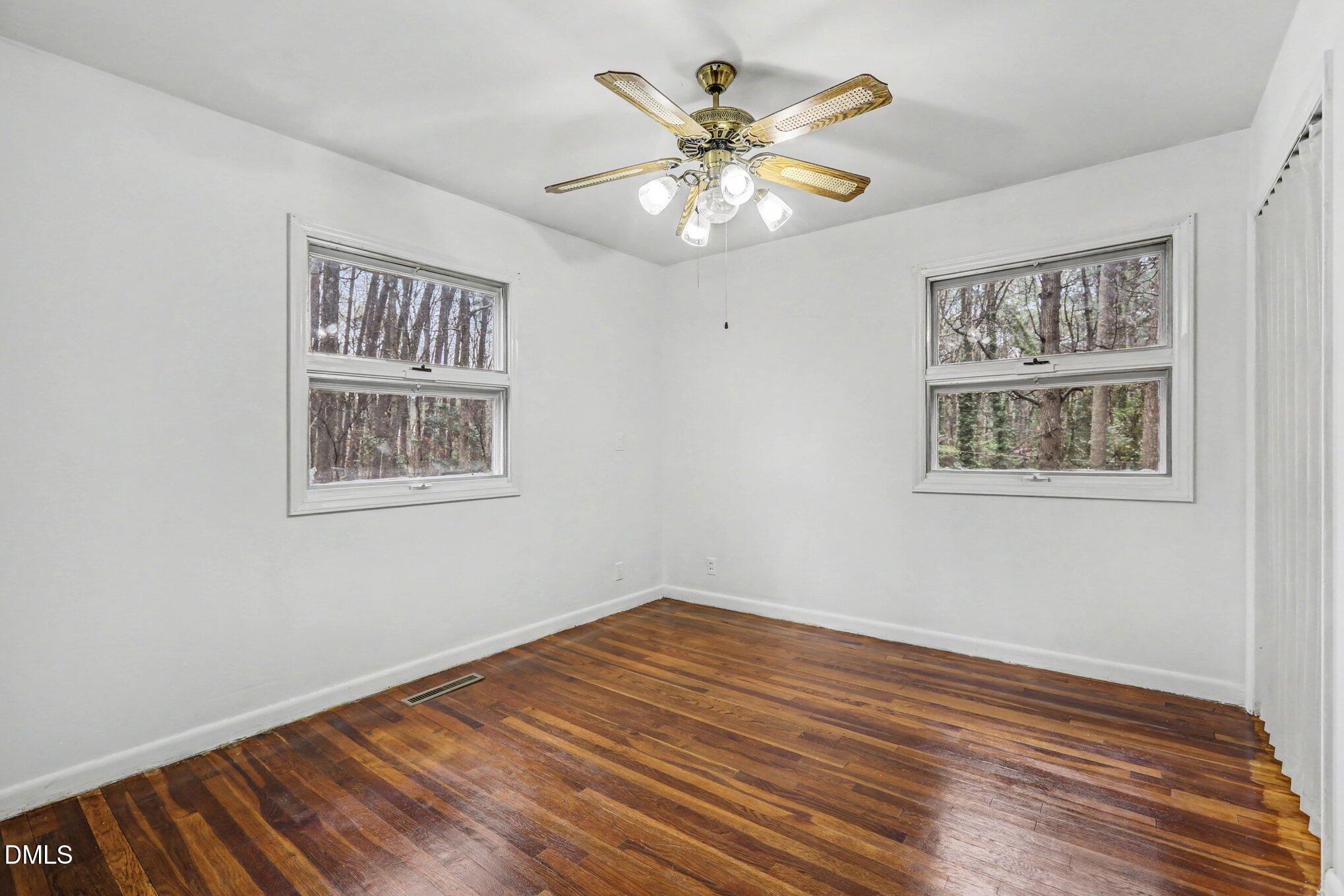 3719 Old Chapel Hill Road Durham, NC 27707 - Photo 15 of 33 a view of empty room with wooden floor