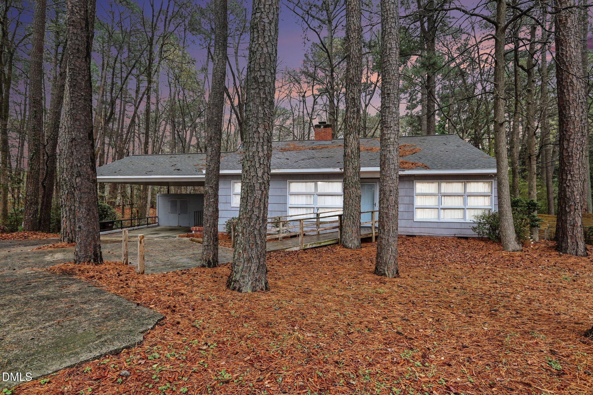 3719 Old Chapel Hill Road Durham, NC 27707 - Photo 30 of 33 a front view of a house with a yard