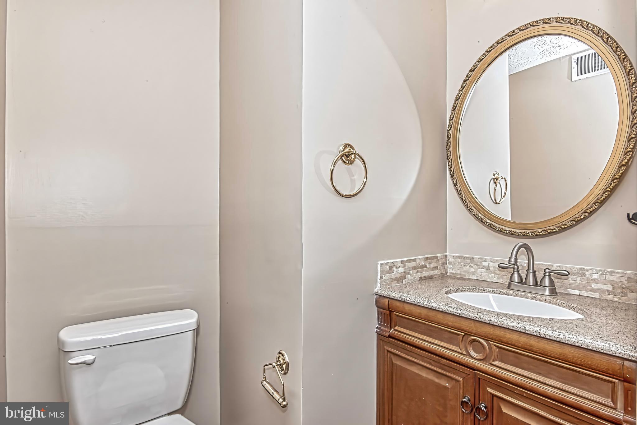12828 Pinecrest Road Herndon, VA 20171 - Photo 41 of 46 Lower Level Half Bathroom