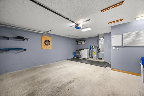 a view of an empty room with bookshelf