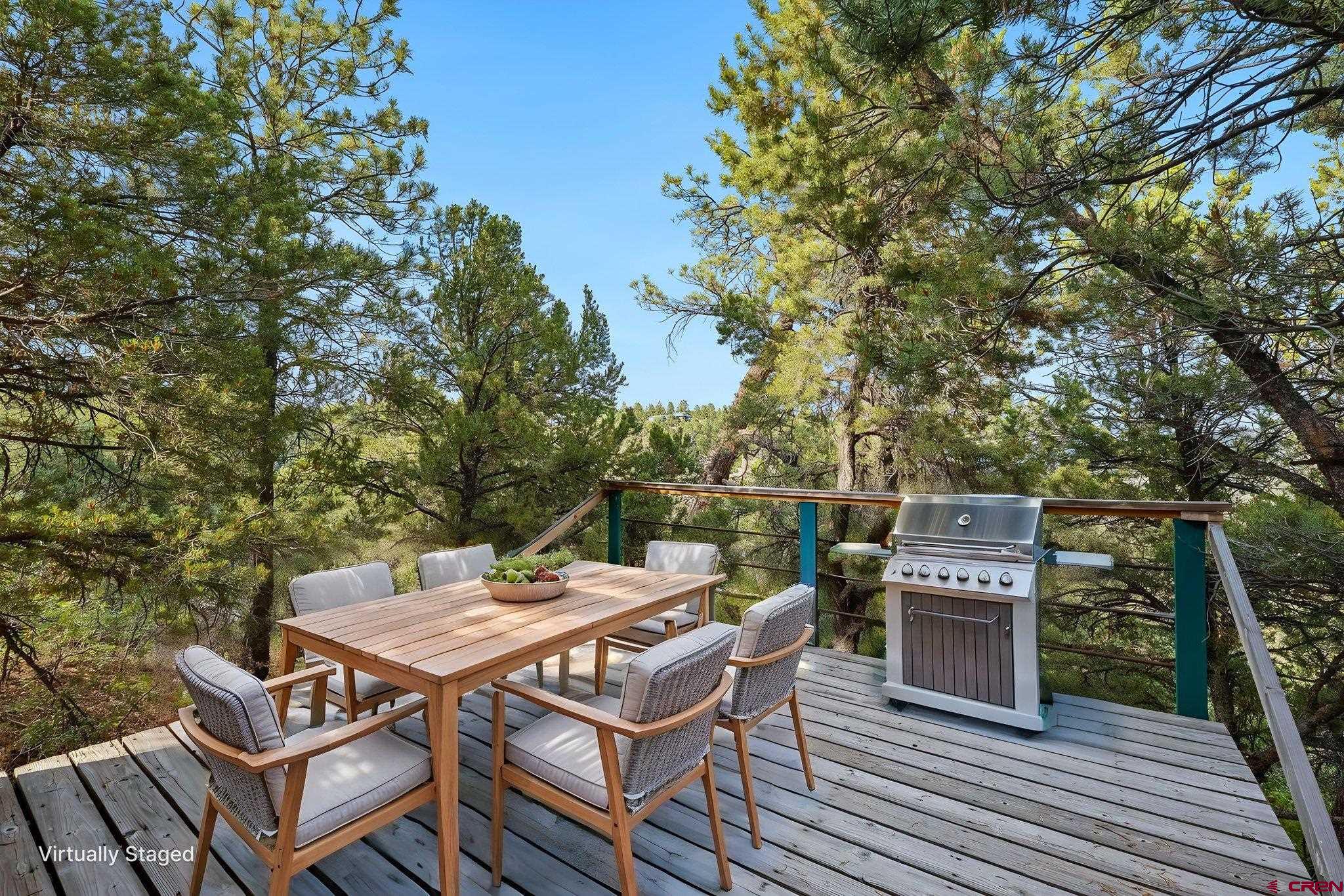 481 Far View Road Durango, CO 81303 - Photo 36 of 45 an outdoor space with furniture and wooden floor