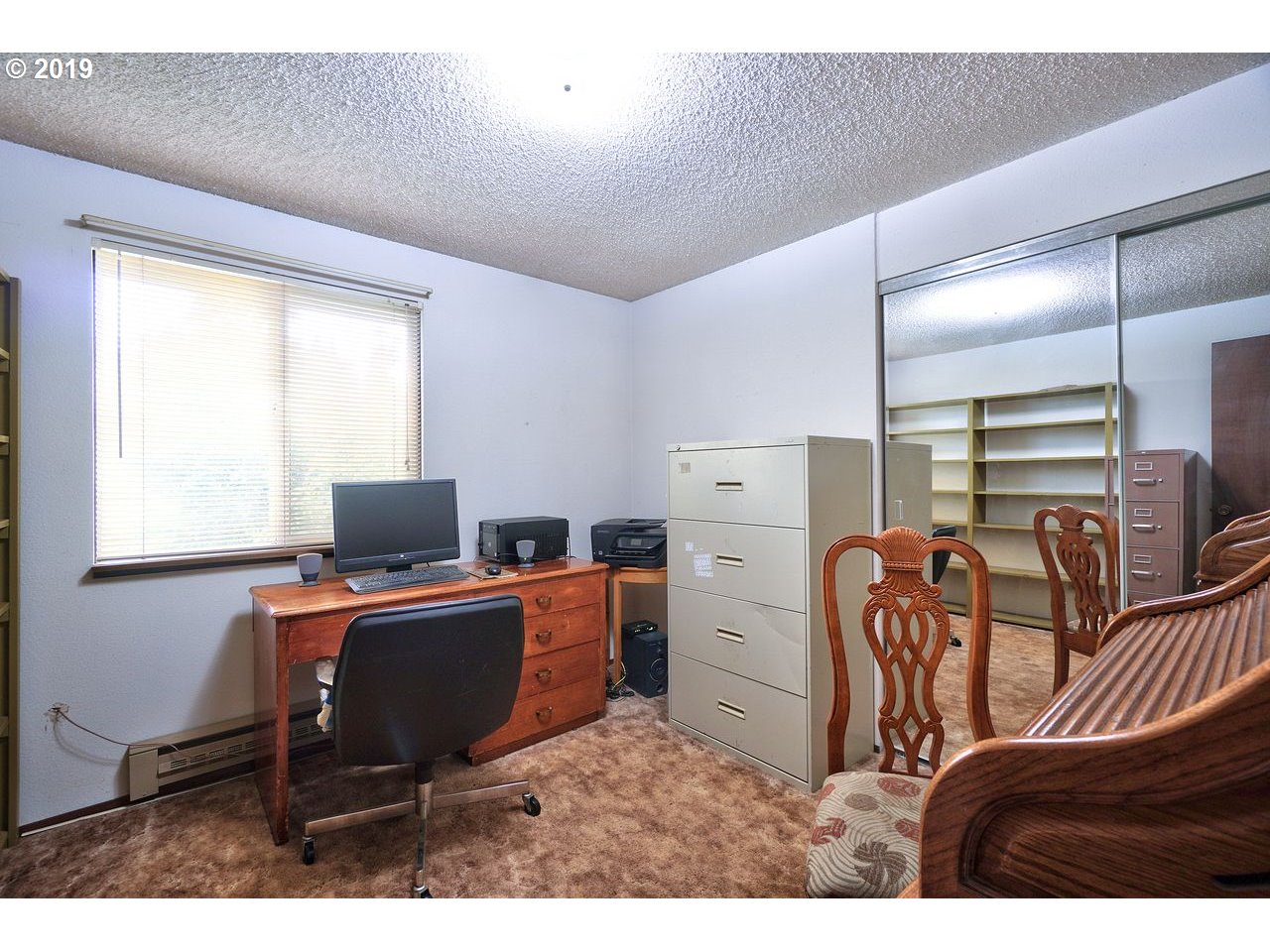 29081 Thistle Hill Road Rainier, OR 97048 - Photo 16 of 32 a bedroom with a workspace