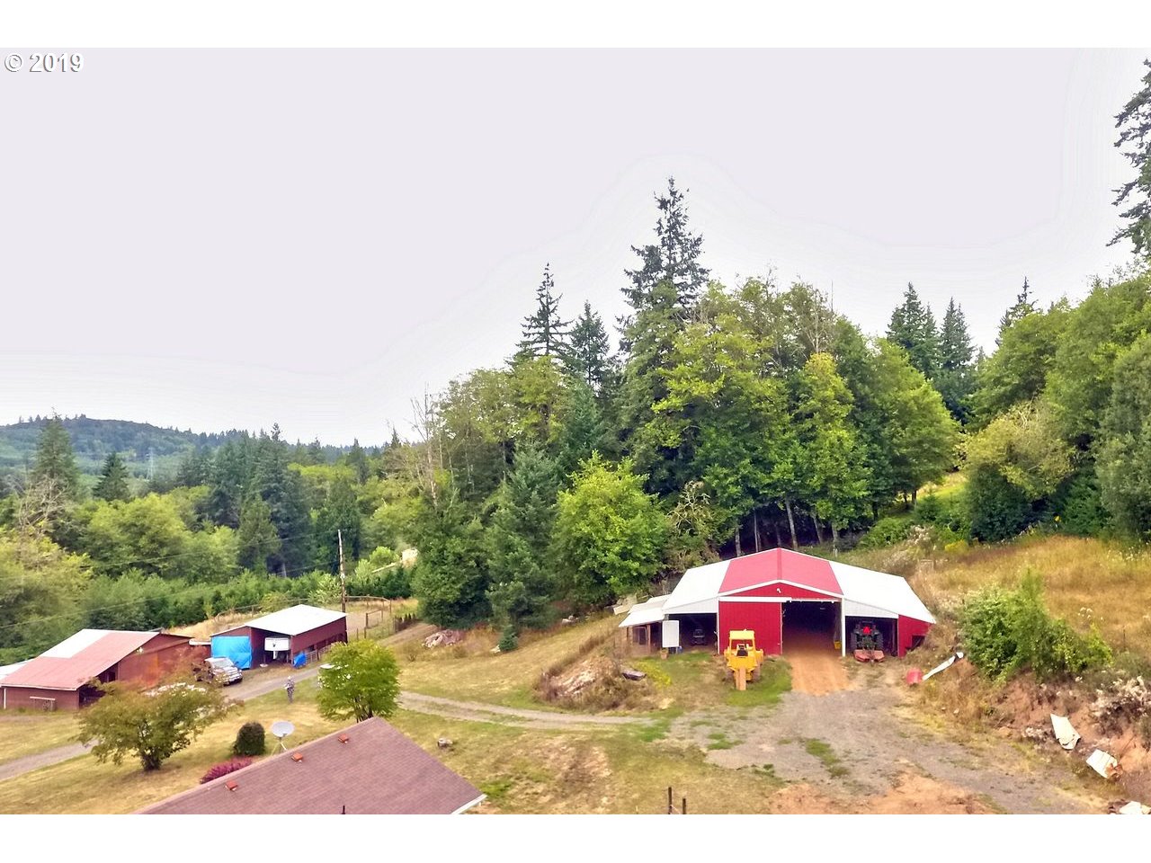 29081 Thistle Hill Road Rainier, OR 97048 - Photo 19 of 32 a view of a yard with an outdoor space