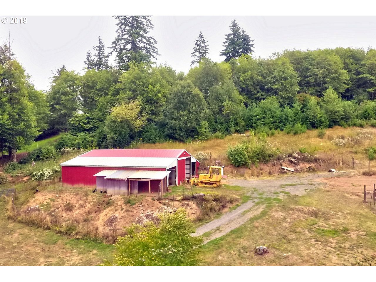 29081 Thistle Hill Road Rainier, OR 97048 - Photo 20 of 32 a view of a swimming pool with a yard