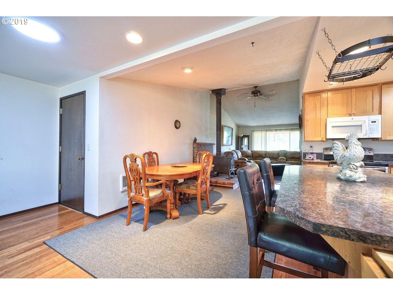 29081 Thistle Hill Road Rainier, OR 97048 - Photo 8 of 32 a view of a dining room with furniture