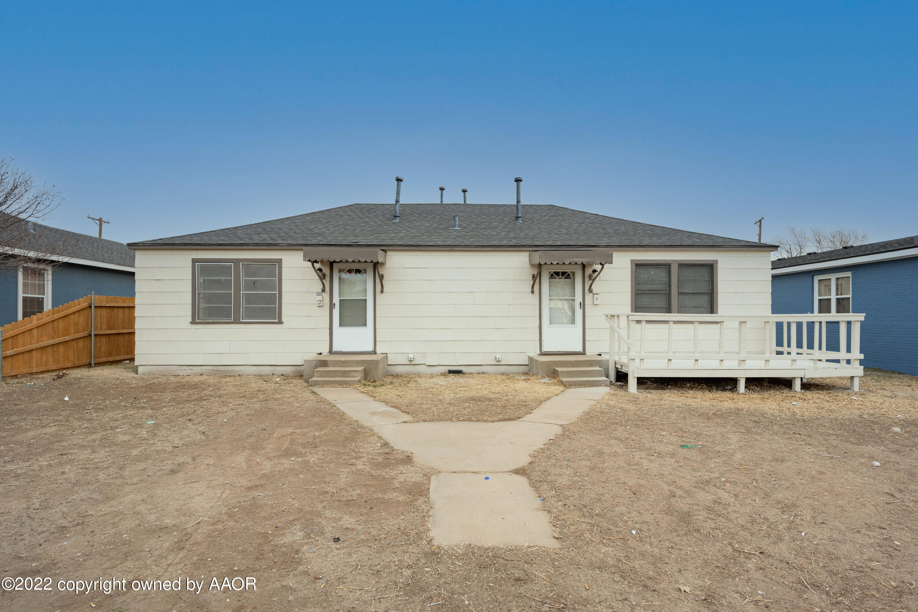 927 South Bryan Street Amarillo, TX 79102 - Photo 1 of 12 a view of a house with pool table and chairs
