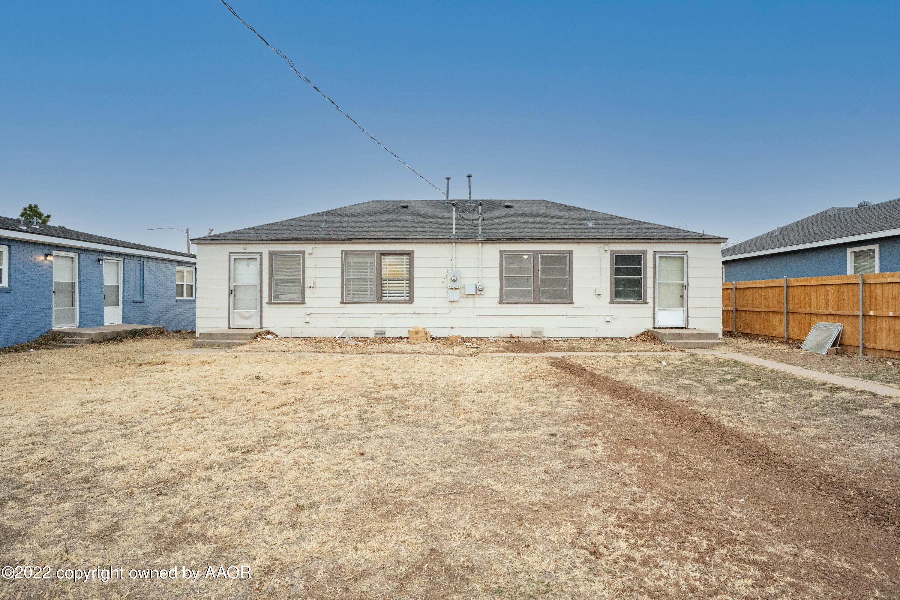 927 South Bryan Street Amarillo, TX 79102 - Photo 12 of 12 a front view of a house with basket ball court
