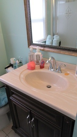 178 Redlands Street Springfield, MA 01104 - Photo 13 of 23 a bathroom with a sink and a mirror