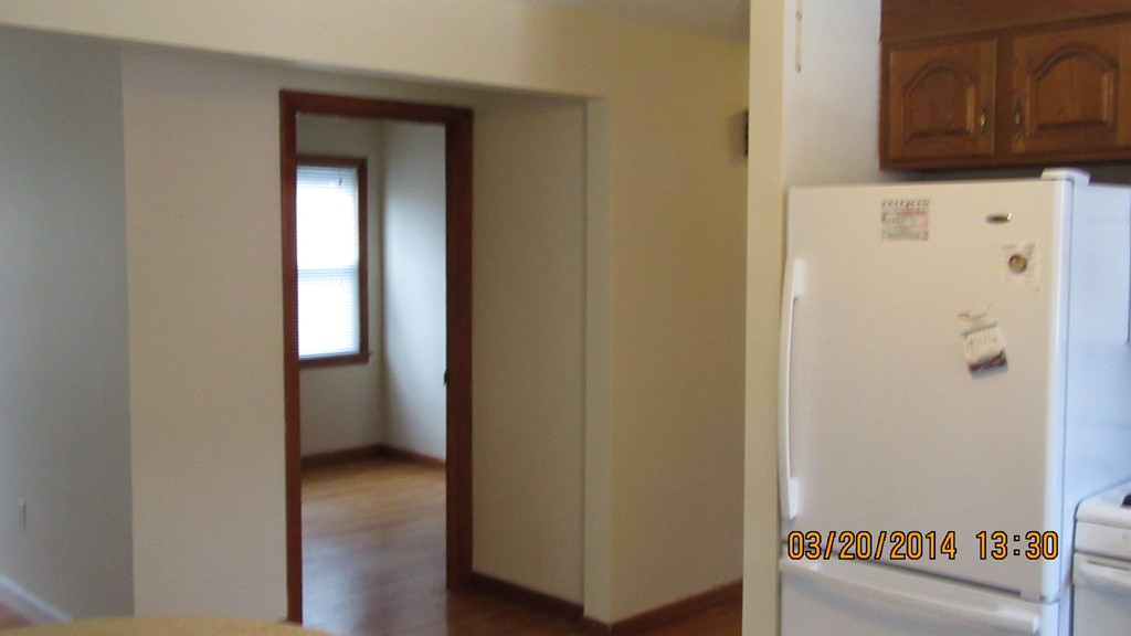 178 Redlands Street Springfield, MA 01104 - Photo 21 of 23 a view of a hallway with wooden floor
