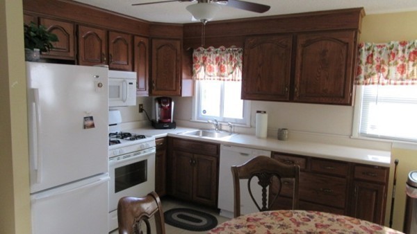 178 Redlands Street Springfield, MA 01104 - Photo 5 of 23 a kitchen with stainless steel appliances a stove a sink and a refrigerator