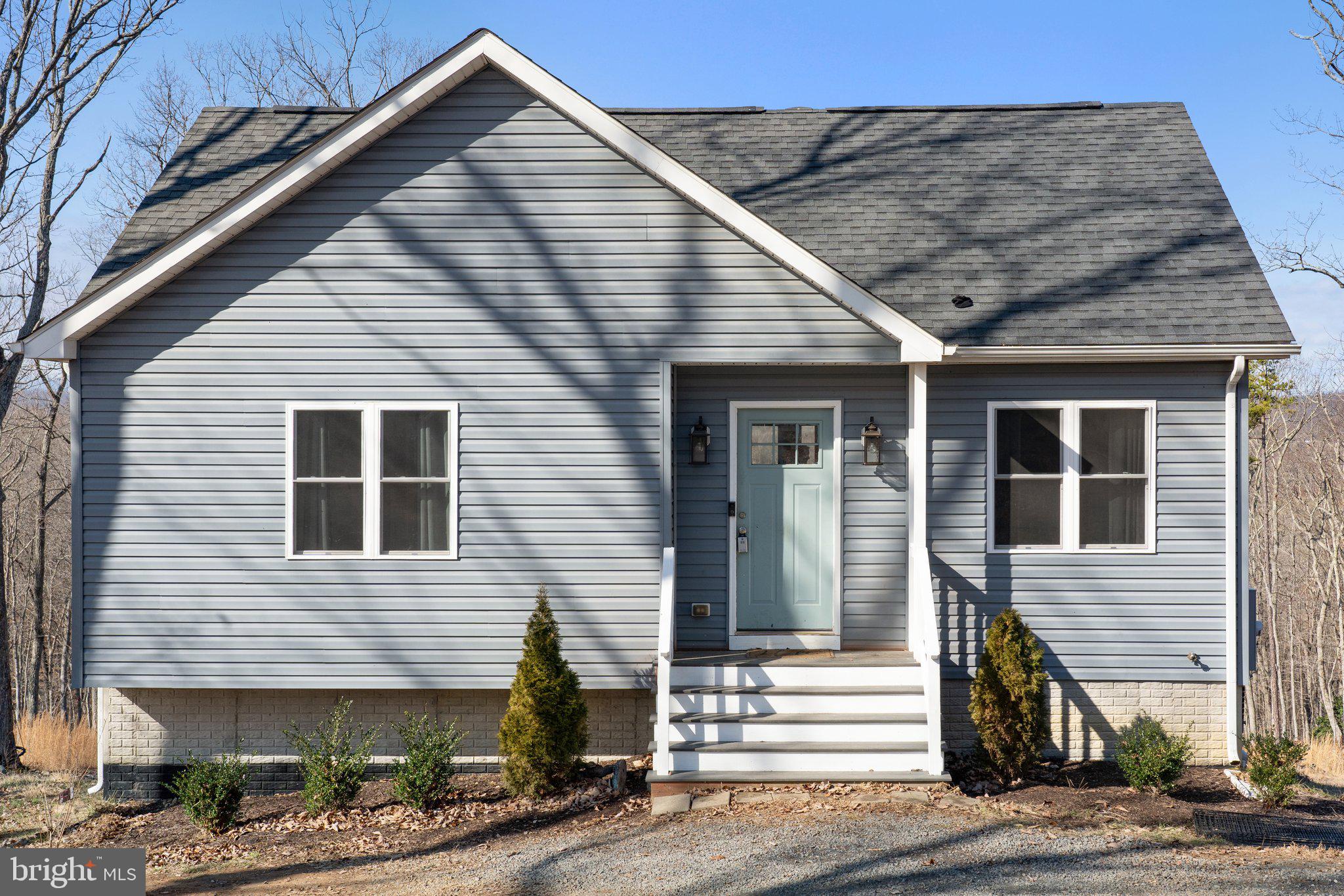 11652 Alum Springs Road Rixeyville, VA 22737 - Photo 2 of 64 a view of a house with wooden fence