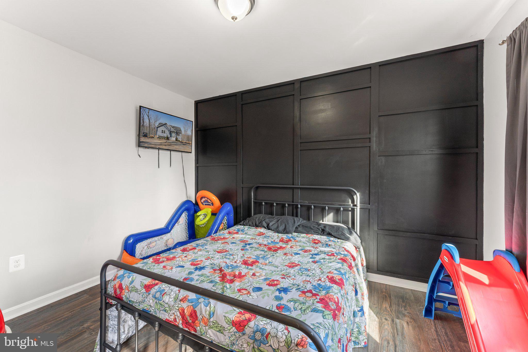 11652 Alum Springs Road Rixeyville, VA 22737 - Photo 22 of 64 a bedroom with two bunk beds and a table