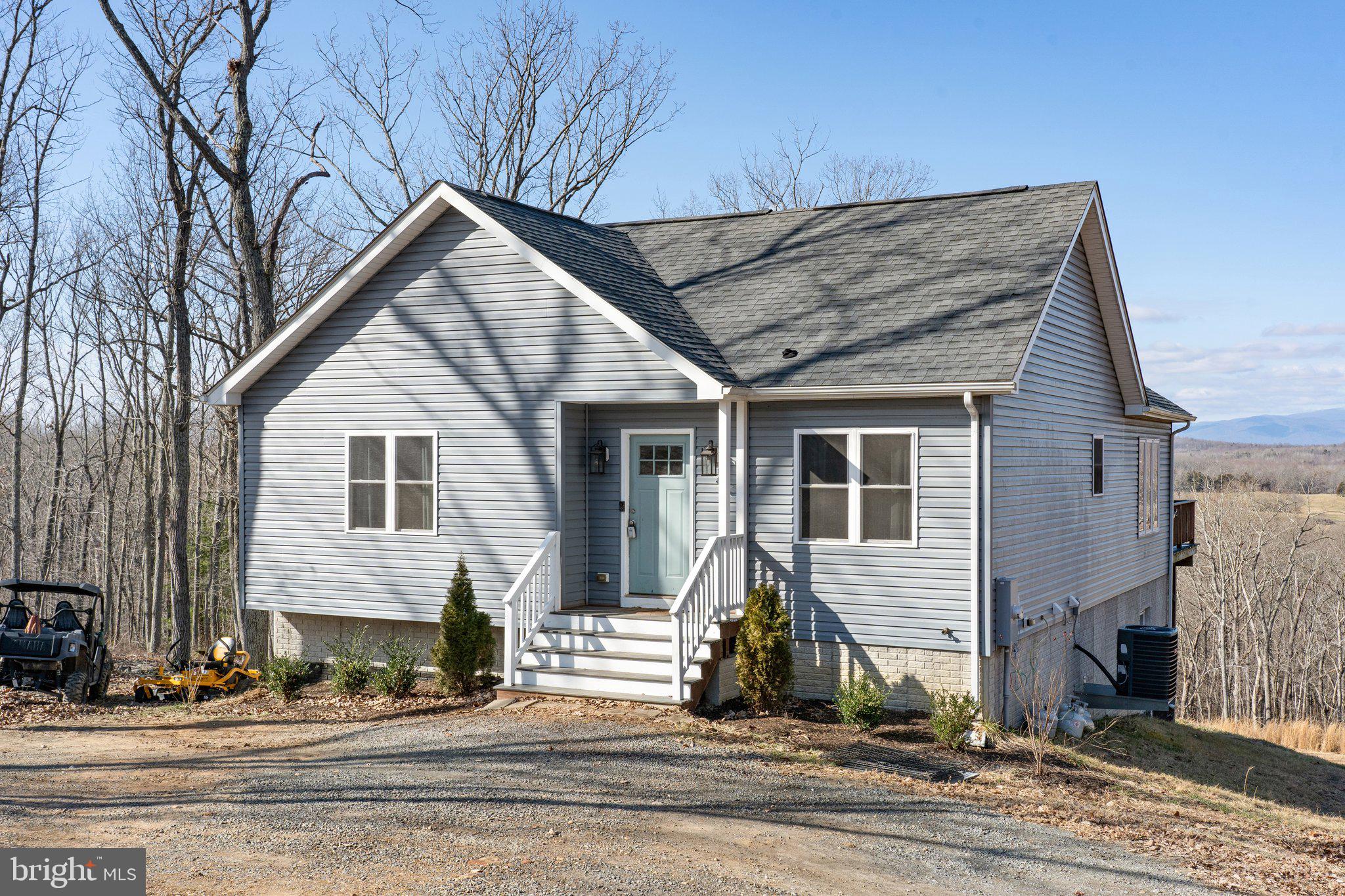 11652 Alum Springs Road Rixeyville, VA 22737 - Photo 4 of 64 a view of a house with a patio