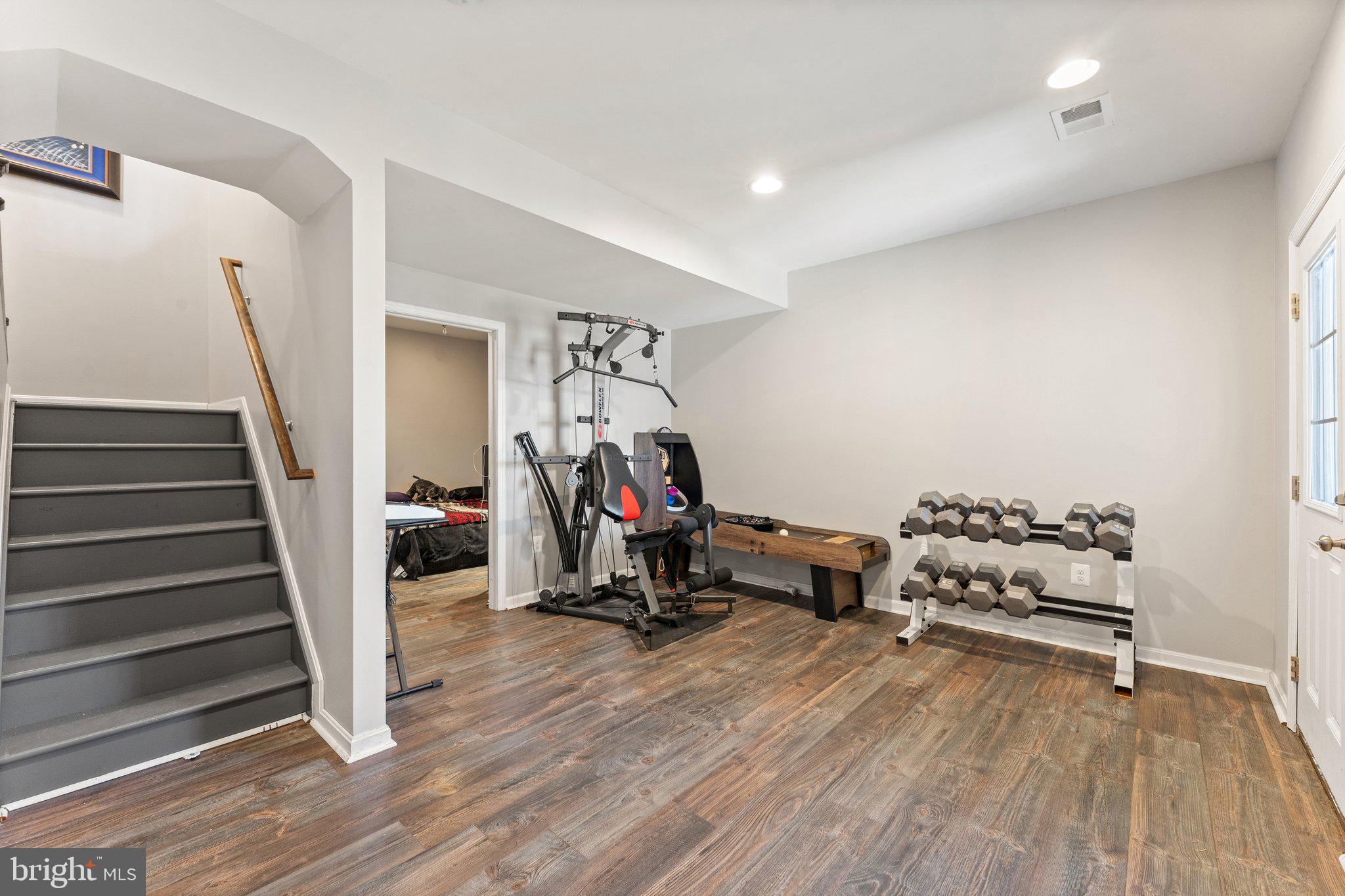 11652 Alum Springs Road Rixeyville, VA 22737 - Photo 41 of 64 a view of a room with wooden floor and stairs